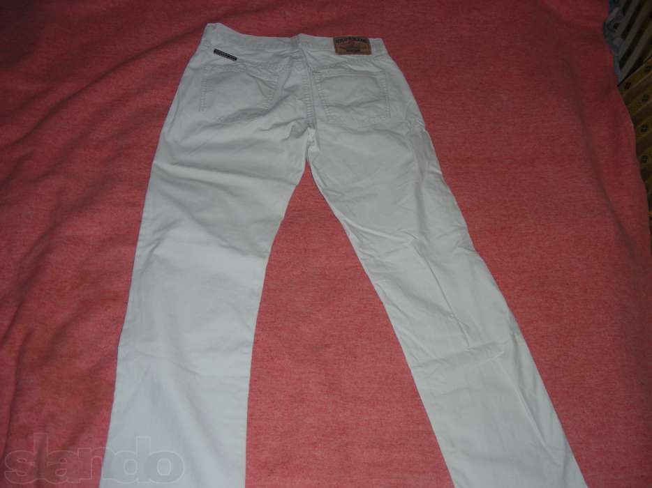Продам летние белые котонновые джинсы на мальчика-подростка