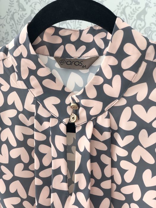 Жіноча блузка в стані нової речі.