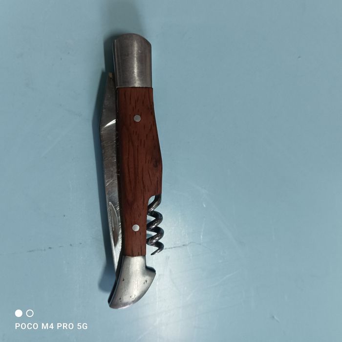 Складний ножик з штопором