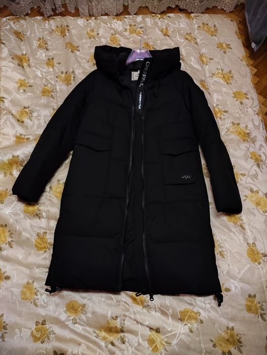 Куртка чорна має наповнювач тинсулей (найтепліший)