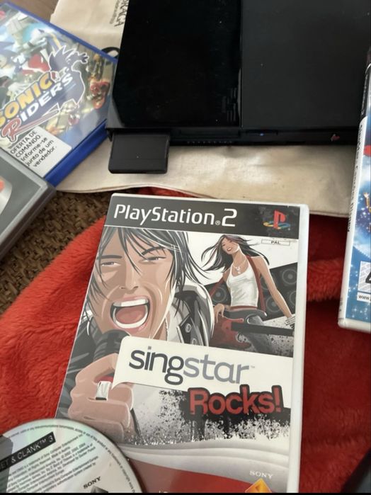 Playstation 2 com comandos e microfones