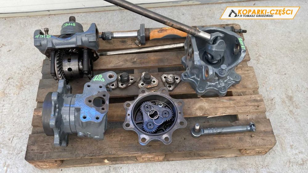 Zwolnica mostu przedniego New Holland LB 110 B / C, CASE 580 SR II (2)