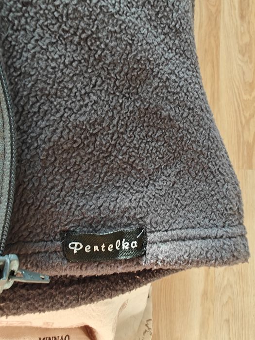 Слингожилетка, слінгоодяг, жилетка для слінгу.