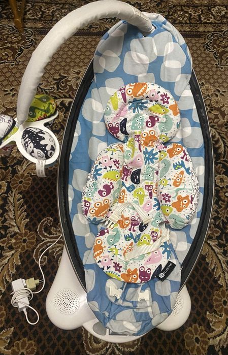 заколисуючий цент 4moms