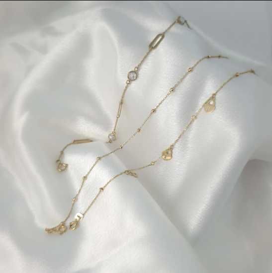 Złota, subtelna bransoletka z kamykami pr.585