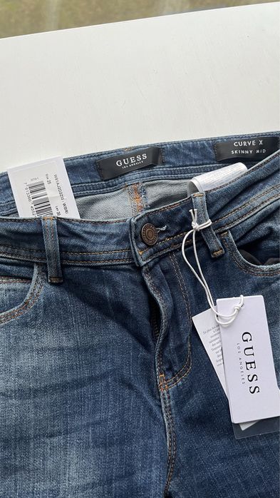 Guess niebieskie jeansy z dziurami W81AJ2D2ZI0 25 L30