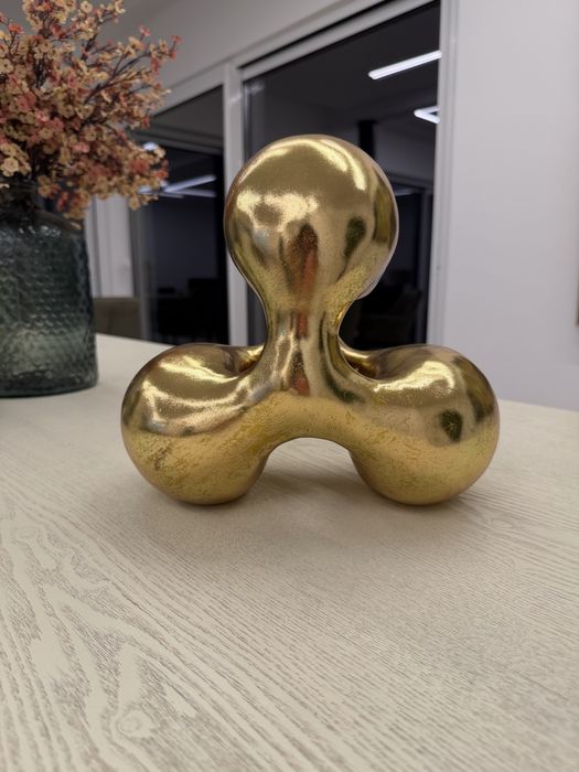 Peças decorativas douradas Kave home