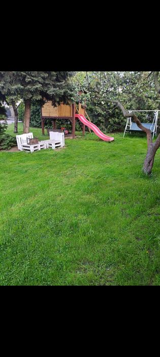 Ogrodowy domek drewniany dla dzieci