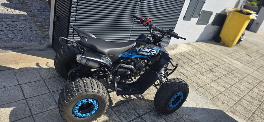Moto 4 cilindrada 125