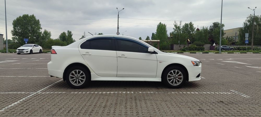 Mitsubishi Lancer 2012 VIN JMBSRCY1ACU005542 фото оголошення 6 з 12