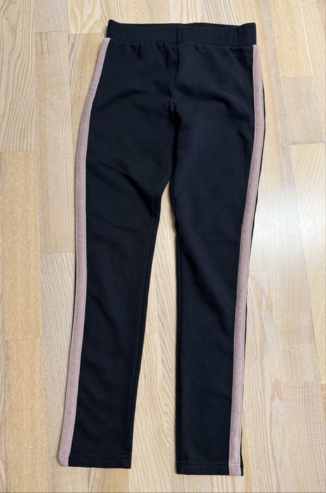 Ciepłe dziewczęce spodnie na polarze legginsy rozm 158
