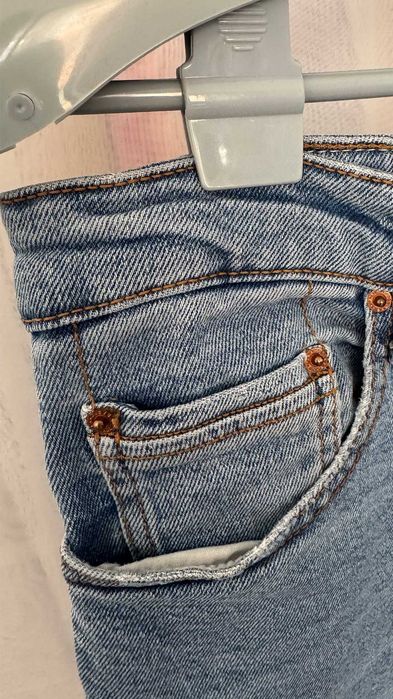 Jeansowe spodnie dzwony Stradivarius 44
