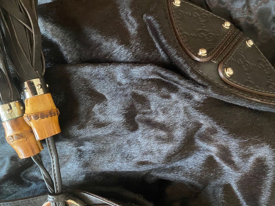 Bolsa/Carteira Gucci em pele poney cor castanho oscuro