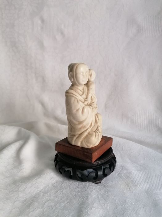 Estatua chinesa antiga pedra