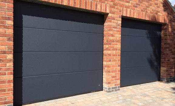 Секційні гаражні ворота нові б/у промислові і побутові ворота в гараж