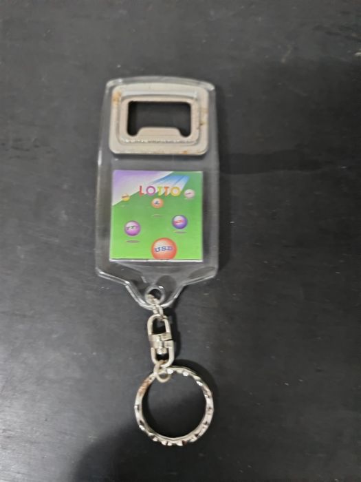 Original porta chaves colleccao,abre,cápsulas e jogo loto.