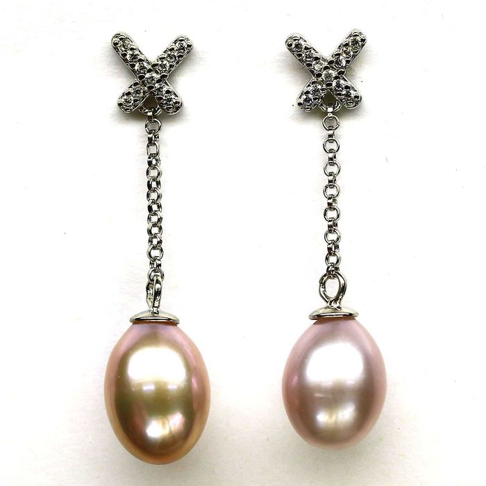 Серебряные серьги с натуральным розовым жемчугом 8 Х 11 мм.