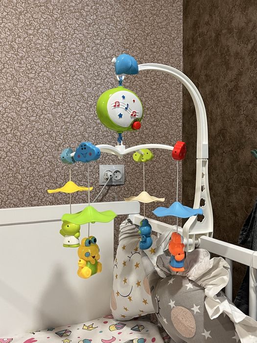 Музичний дитячий мобіль на ліжко