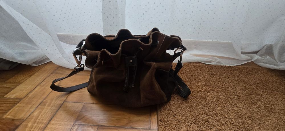 Mala castanha em pele