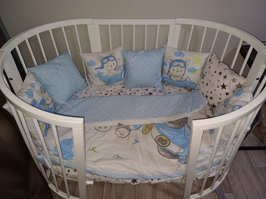 Овальне ліжечко з маятником 5в1