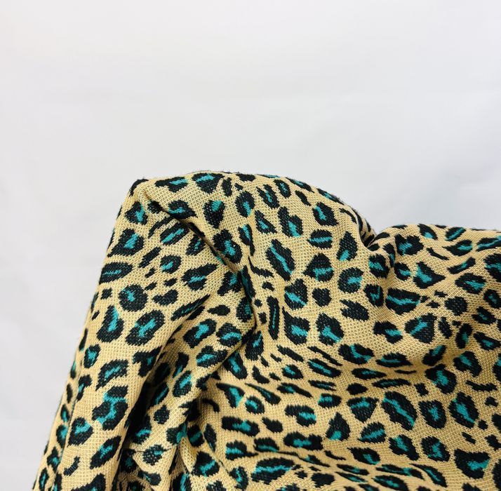 Beżowa bluzka w panterkę z turkusem S 36