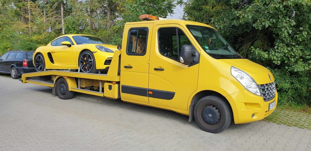 Auto laweta Pomoc drogowa 24/7 transport europa holowanie