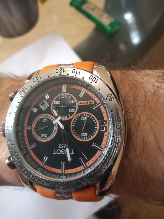 Zegarek marki Tissot srebrno pomarańczowy