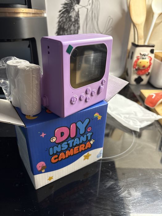 Maquina fotografica instantanea