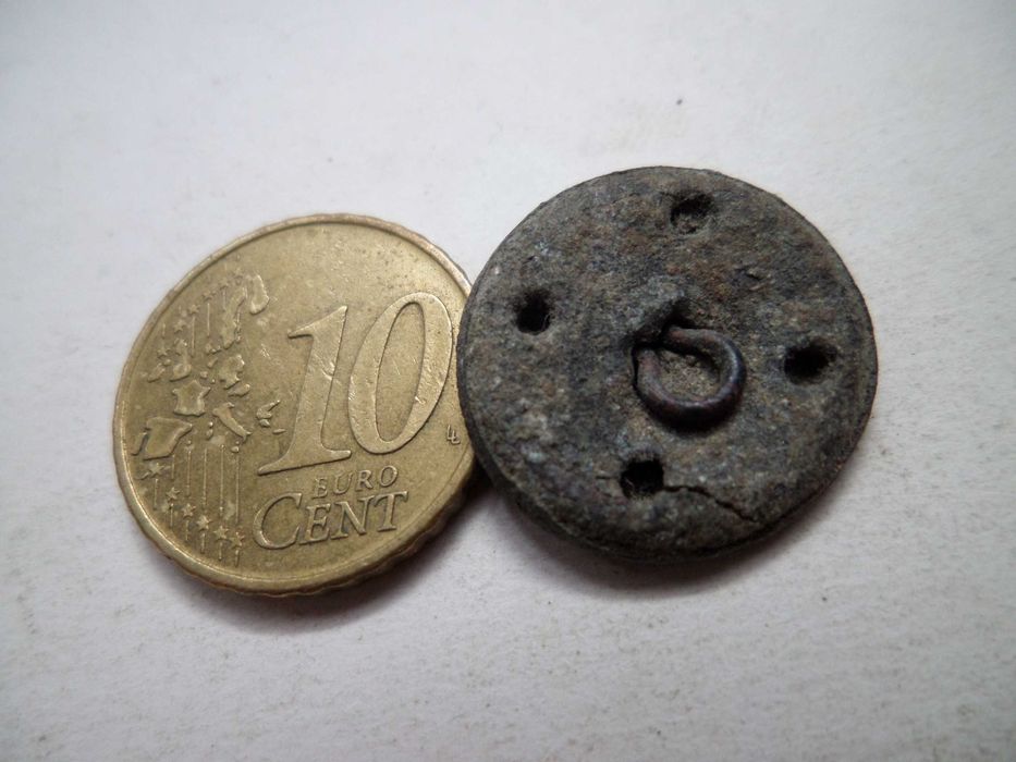 Botão antigo em Metal