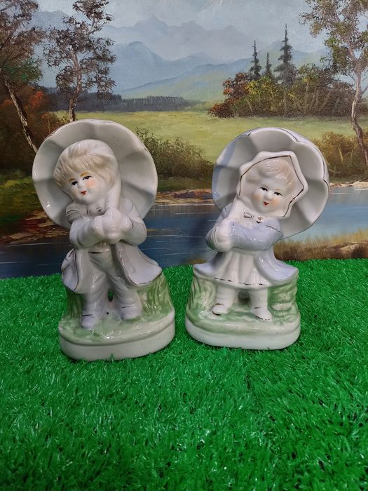 Figurki porcelanowe chłopiec i dziewczynka