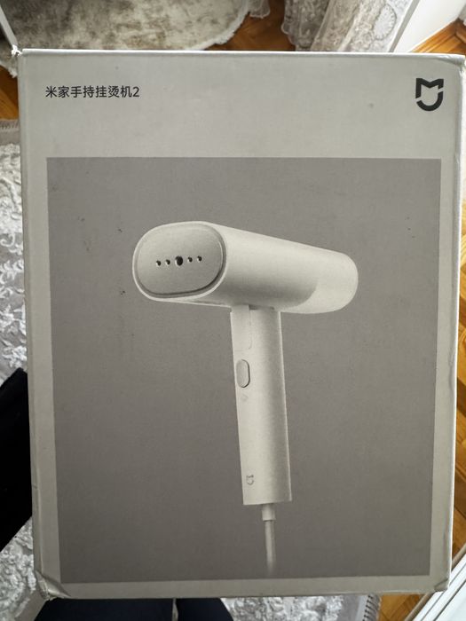 Відпарювач для одягу, парова праска