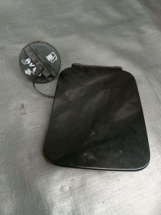 Chevrolet Aveo 1, 4 B sedan klapka wlewu paliwa,+ korek
