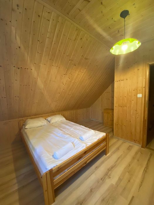 Całoroczny domek nad jeziorem Dadaj z kominkiem i klimatyzacją