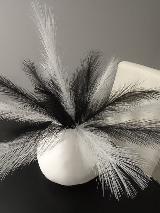 Centro de mesa com plumas