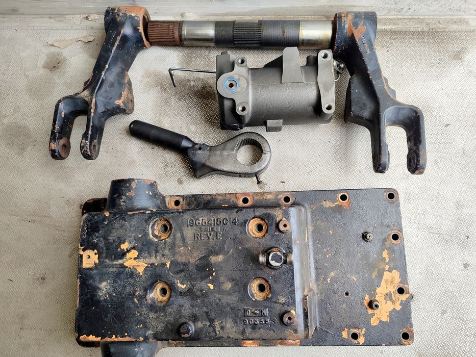 Cylinder, ramię, wałek,obudowa podnośnika Case 7250,7240,7230,7220