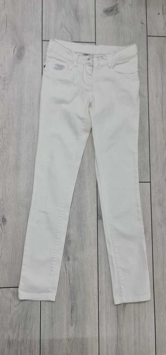 Białe jeansy r. 140/146
