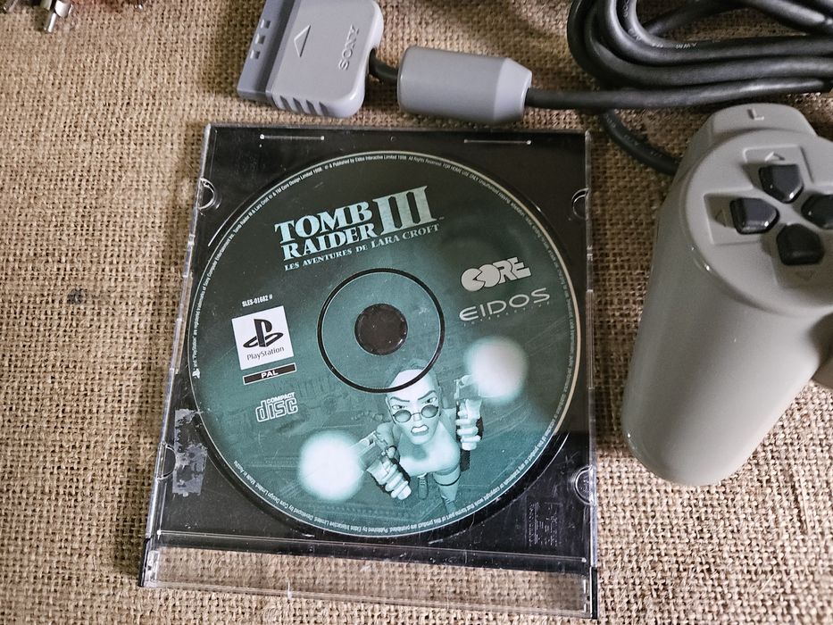 Consola ps1  com um jogo