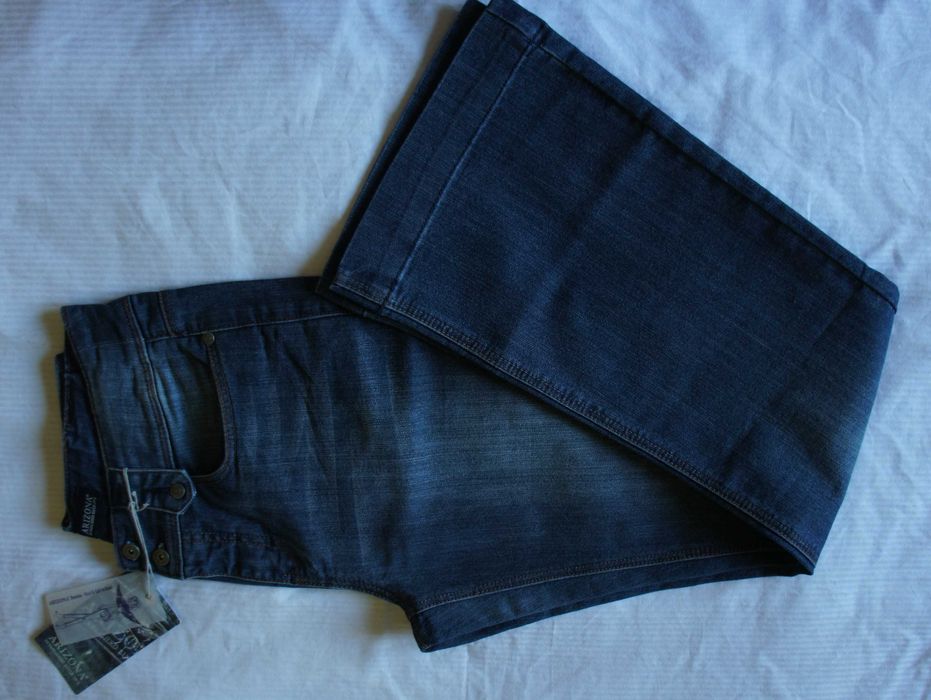 damskie spodnie dżinsy dzwony wysoki stan 40 L jeans flare za 1/2 ceny