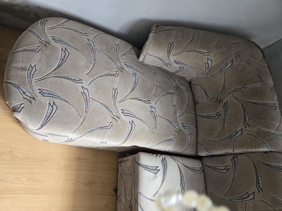 Narożnik z funkcją spania z pufą sofa