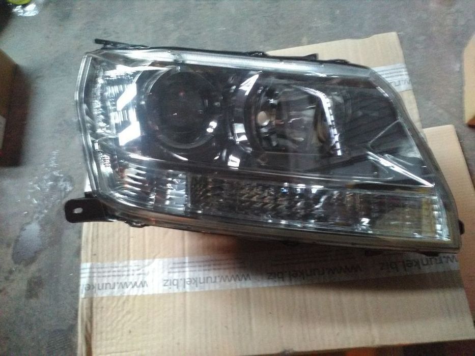 Farol frente grand vitara 2006  novo