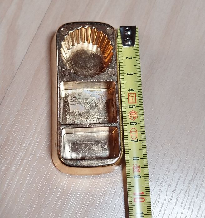 Abre cápsulas antigo em forma de barra de ouro