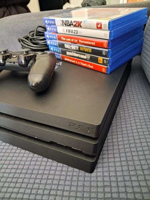 PS4 Pro 1TB + Comando + 6 Jogos – Excelente estado!
