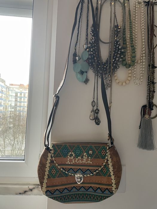 Vendo mala a tiracolo