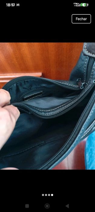 Mala com bolsos e muita arrumação, em excelente estado
