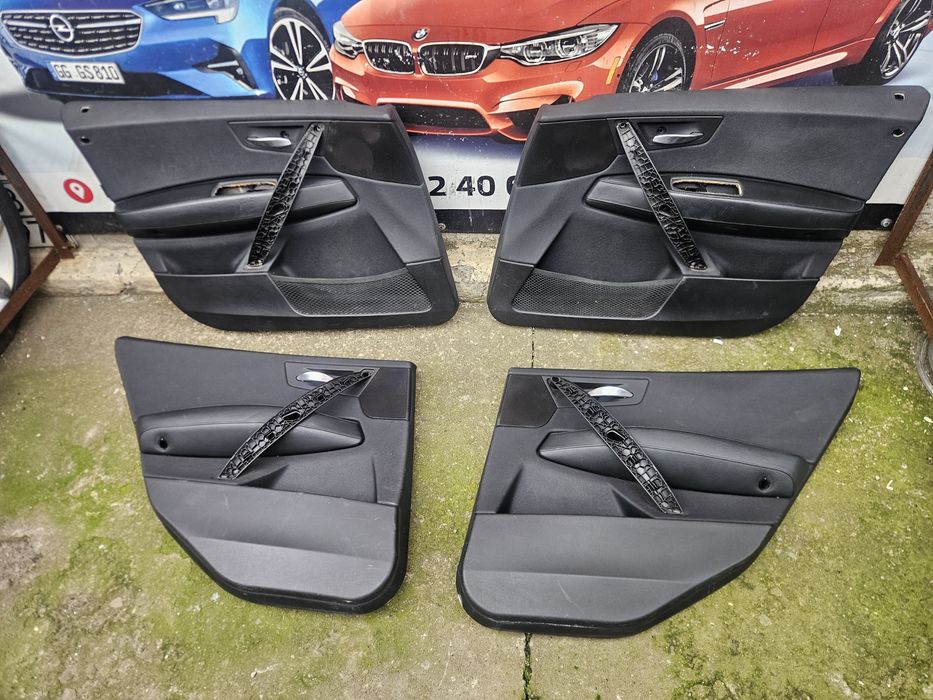 Дверні карти БМВ Х3 Е83 BMW X3 E83 обшивки шкіряні карти кожание
