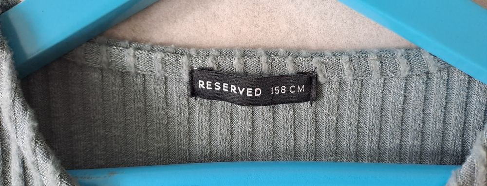 Szaro-niebiedka sukienka z długim rękawem marki CoolClub by Smyk.