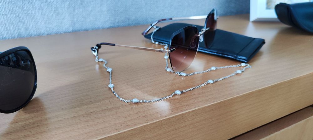 Dois Óculos de sol64409563665794122