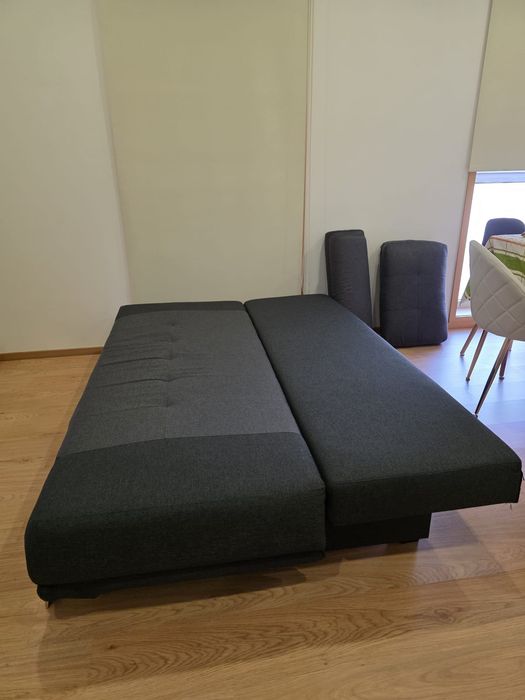 Sofá cama Conforama cinza e negro
