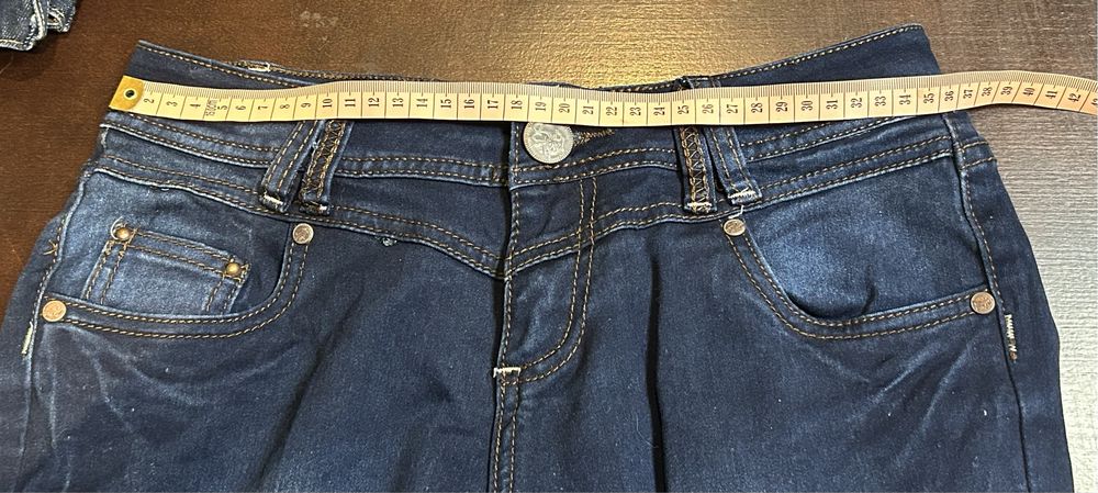 Spodnie jeans damskie XS niebieskie dżins przecierane
