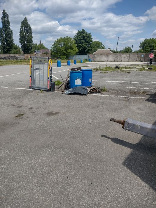 Заасфальтована огороджена площадка(майданчик)для різних потреб